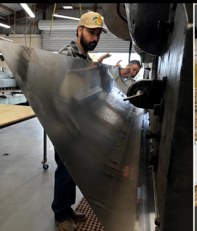 Fabricator forming stainless steel on the press brake